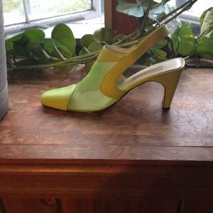 Green see thru pumps.